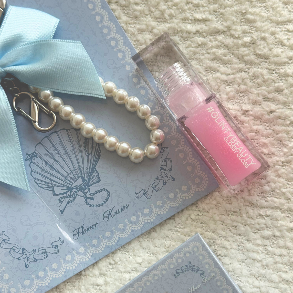 Set 2 piezas Flower Knows + Glinty Iluminador y Gloss